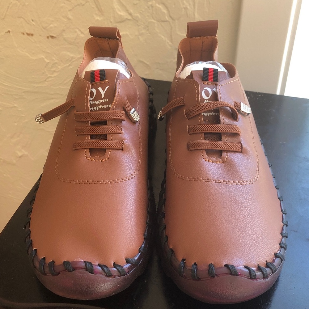 OY soft light brown leather like material size 36